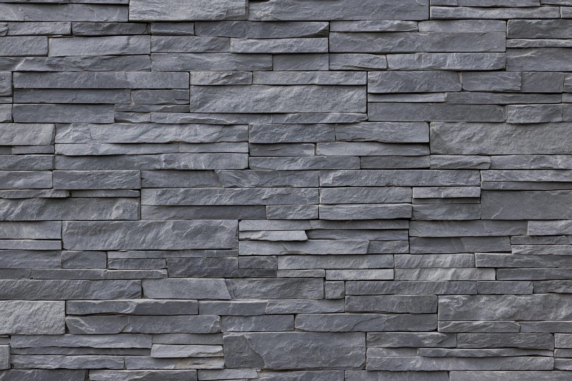 Stacked slate stone wall panel filling the frame