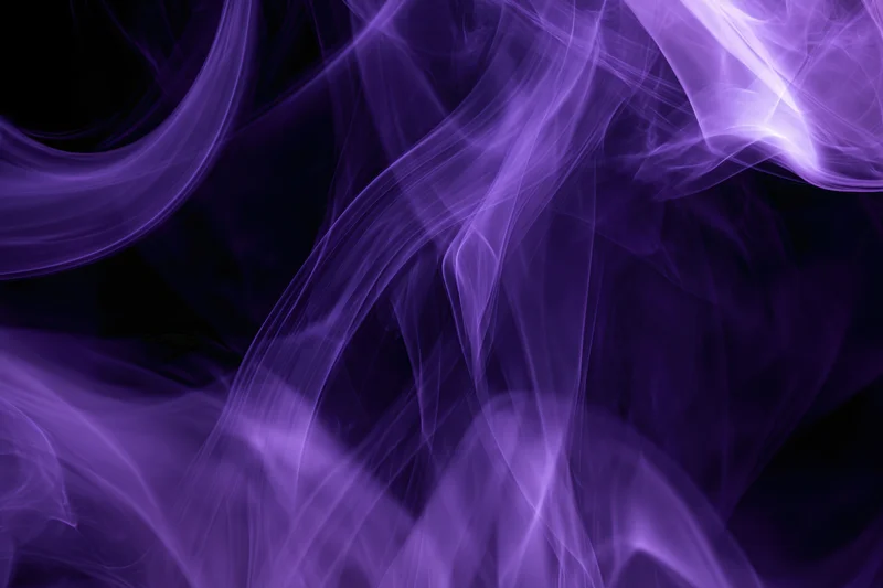 Swirling purple smoke filling the frame as an abstract background