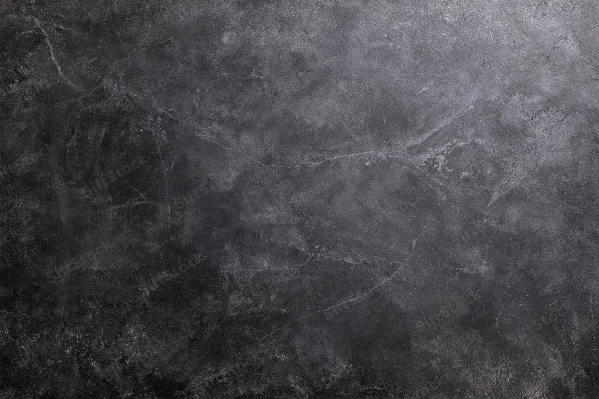 Weathered concrete wall surface filling the frame