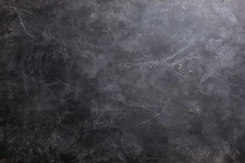 Weathered concrete wall surface filling the frame