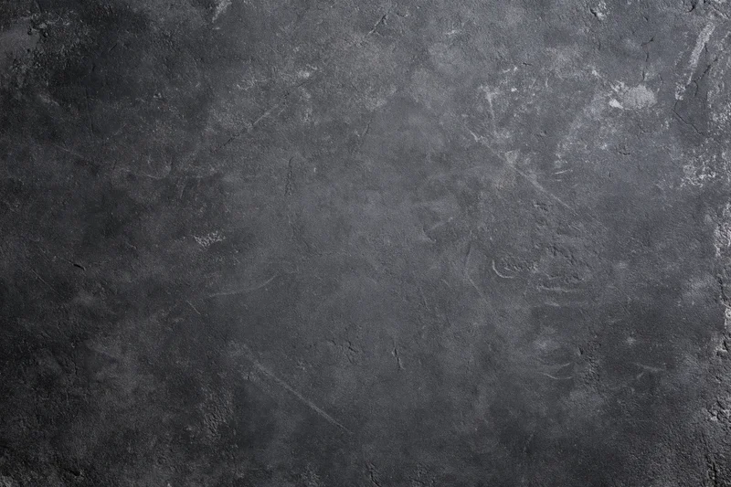 Weathered concrete wall surface filling the frame