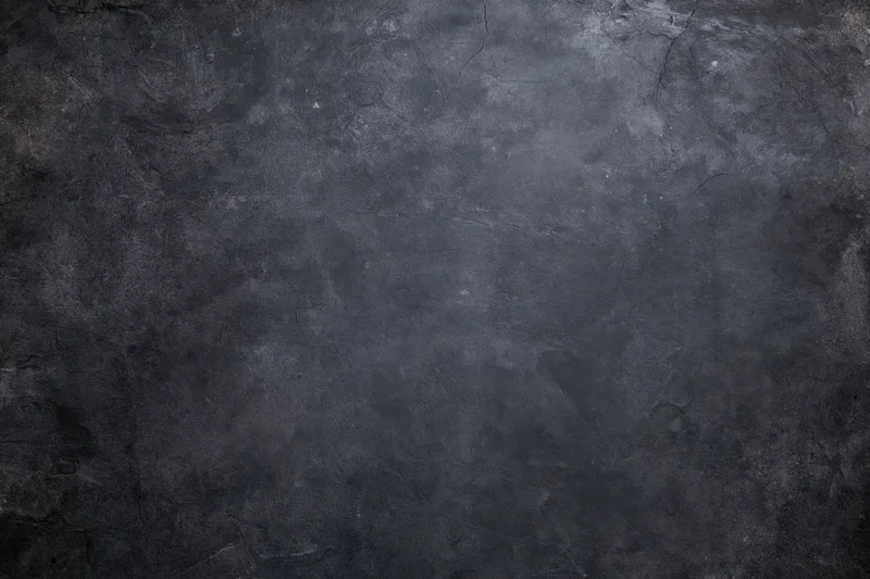 Weathered concrete wall surface filling the frame