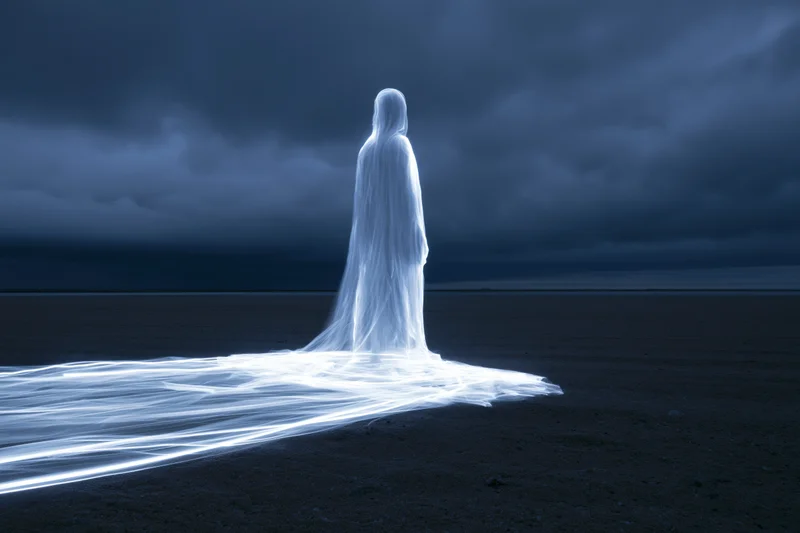 Glowing spirit figure standing on a dark beach under stormy sky