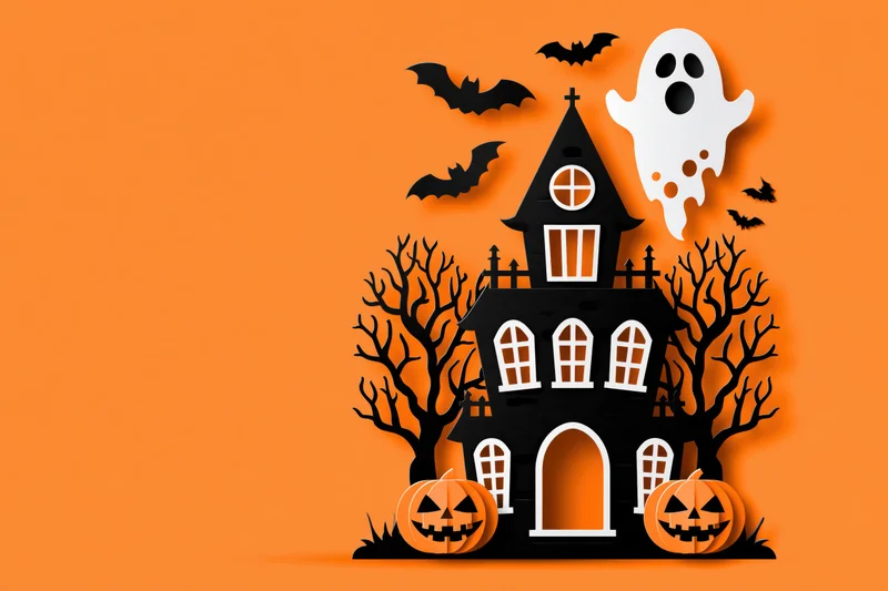 Flat paper cut illustration of a haunted house with ghost, bats, pumpkins and bare trees on orange background
