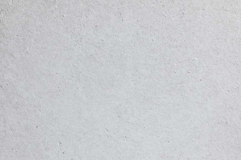 Close-up of a bare concrete wall surface filling the frame