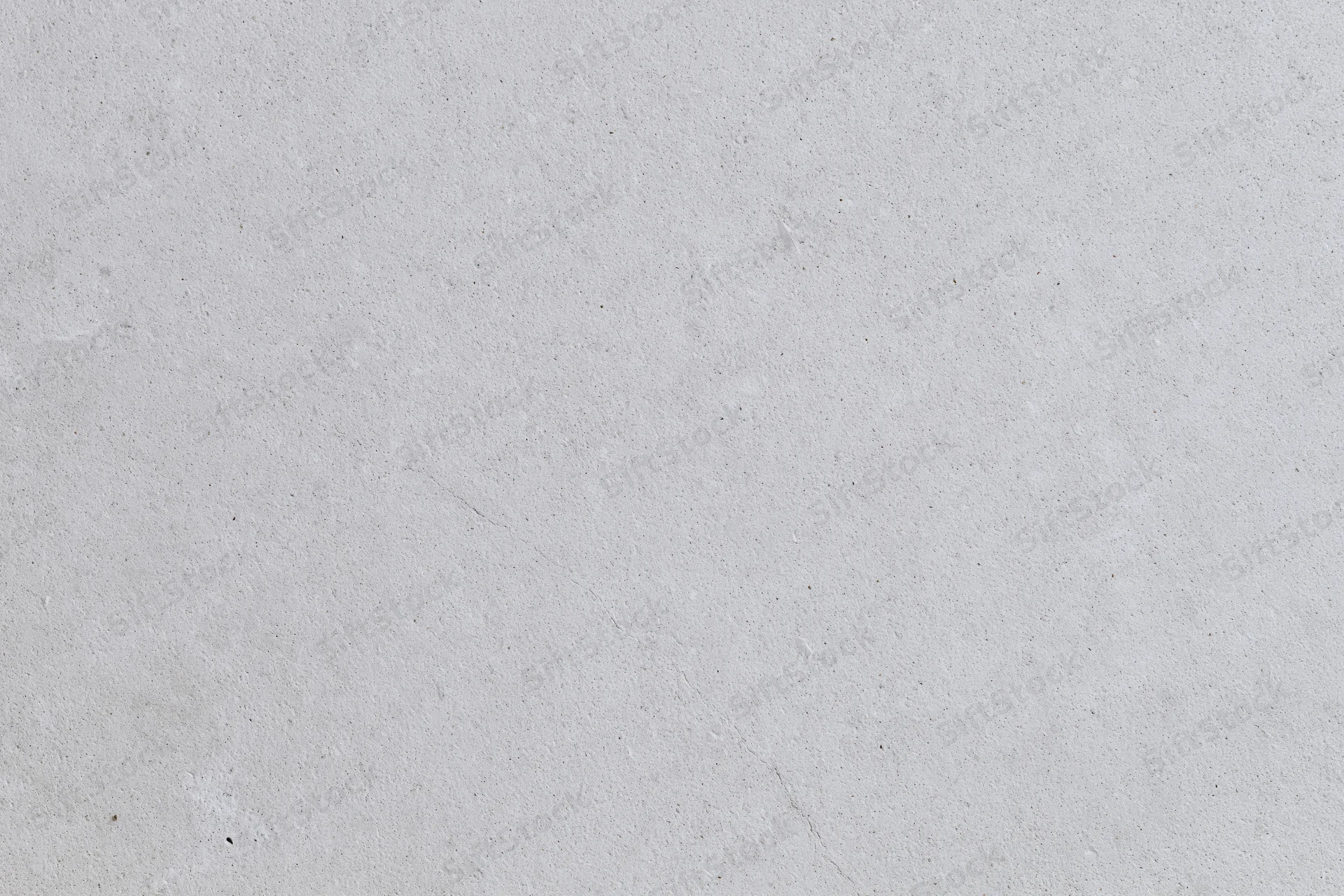 Close-up of a bare concrete wall surface filling the frame