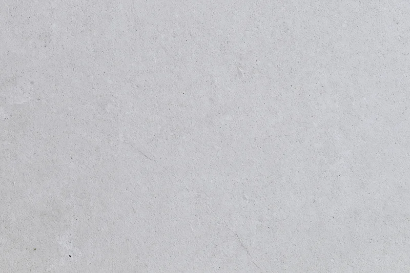 Close-up of a bare concrete wall surface filling the frame