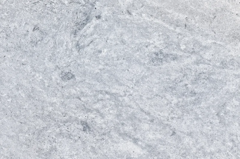 Close-up of natural grey marble stone surface with veined texture