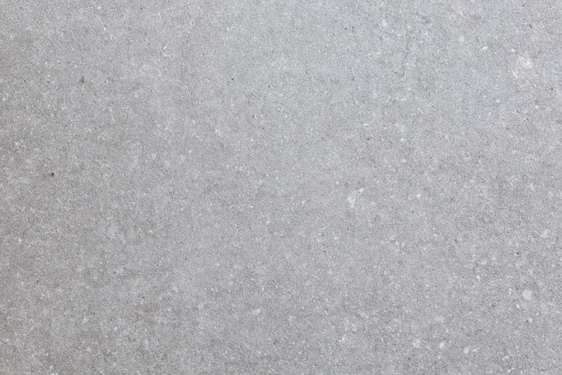 Close-up of rough gray concrete surface