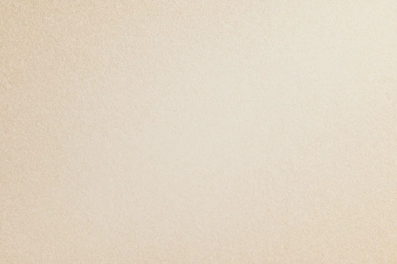 Close-up flat lay of smooth fine sand surface filling the frame