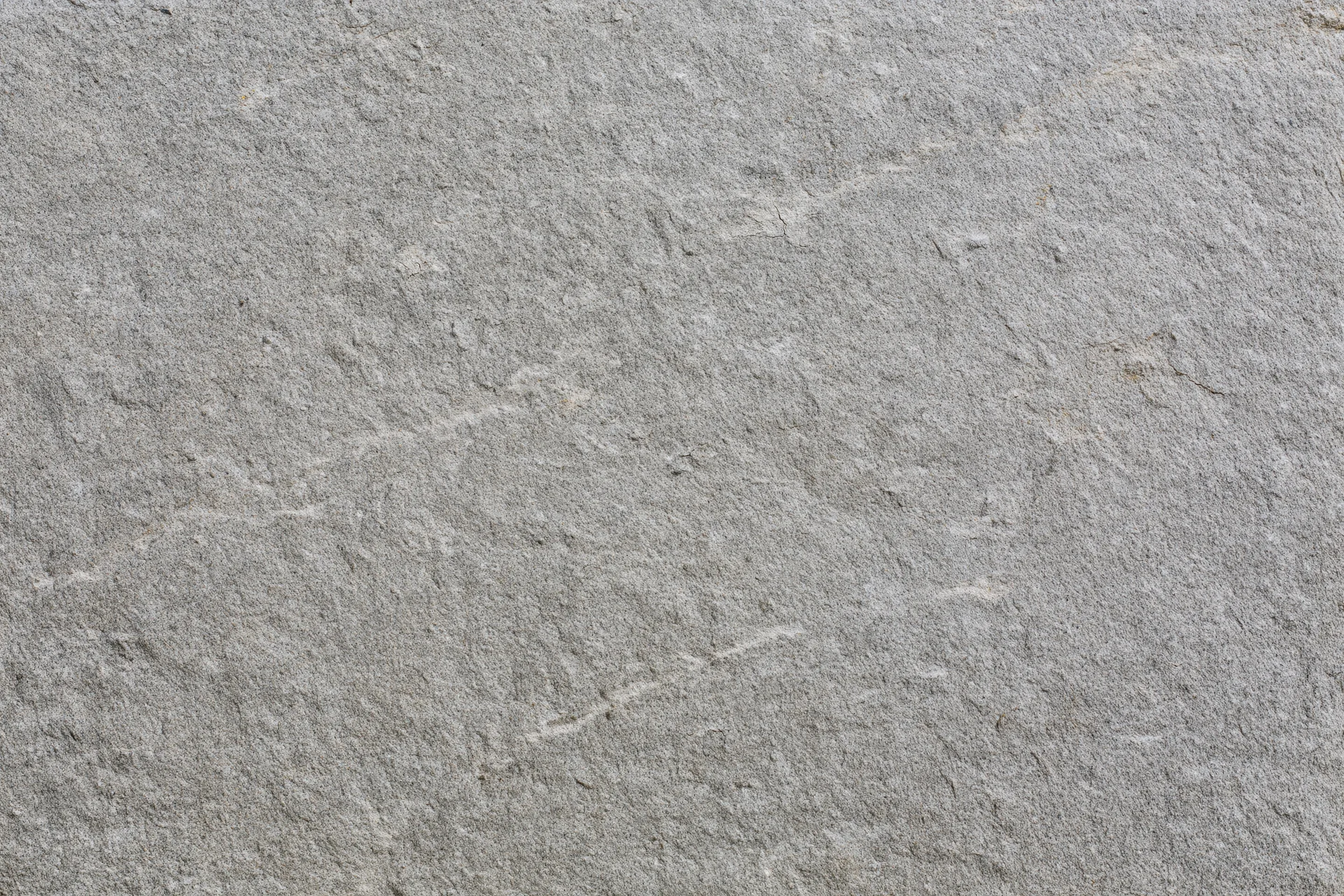 Close-up of rough natural stone surface filling the frame