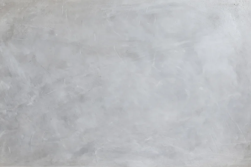 Close-up of a textured concrete wall surface filling the frame