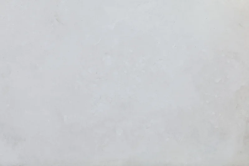 Textured concrete wall surface filling the frame