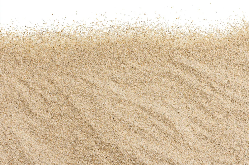 Dry beach sand spread across lower half of frame on white background