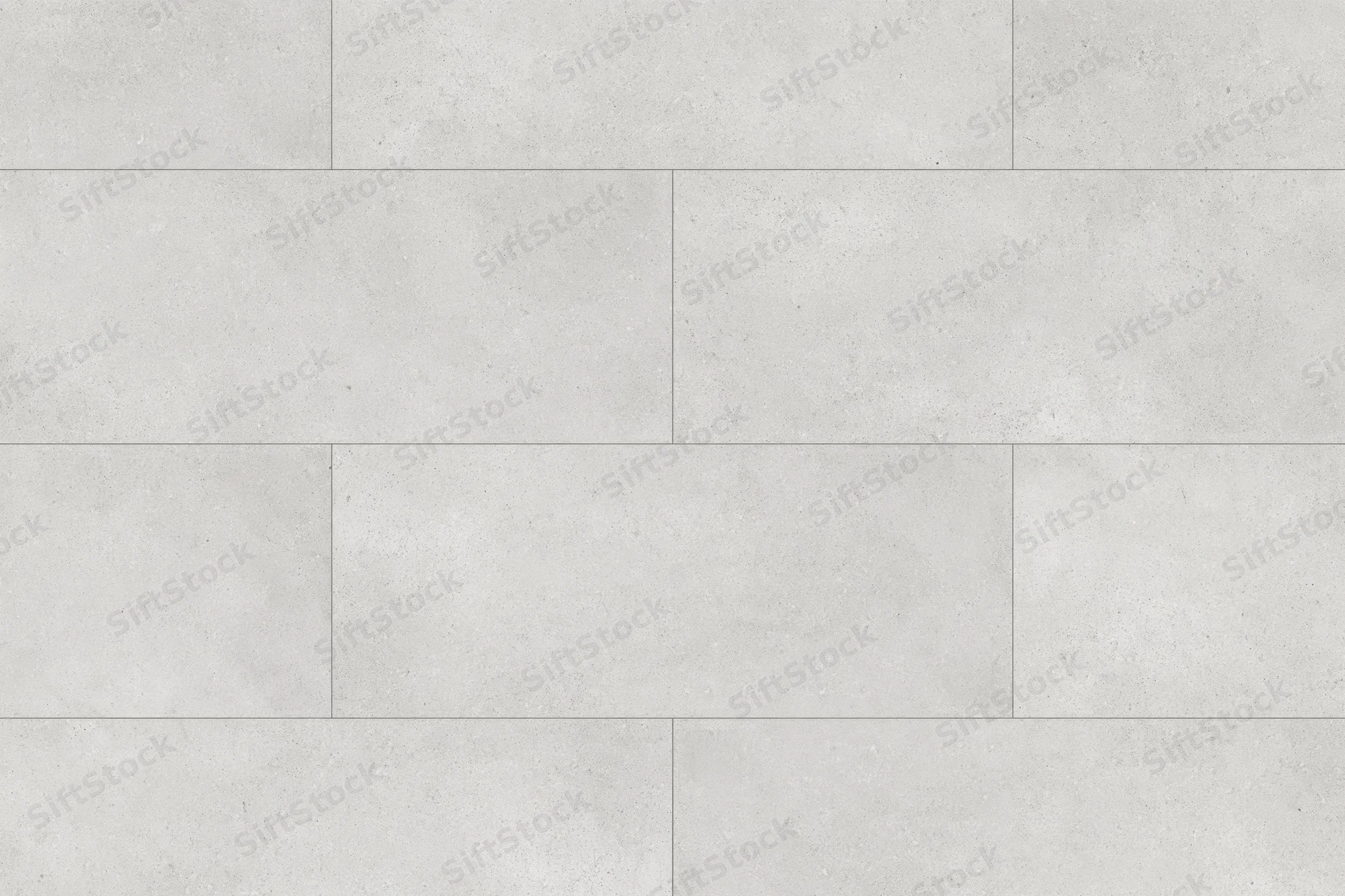 Large-format light grey concrete tiles arranged in a staggered pattern on a floor