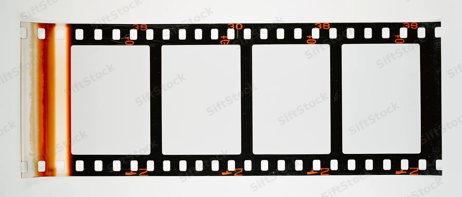 Blank 35mm film strip with four white frames and orange edge numbers on white background