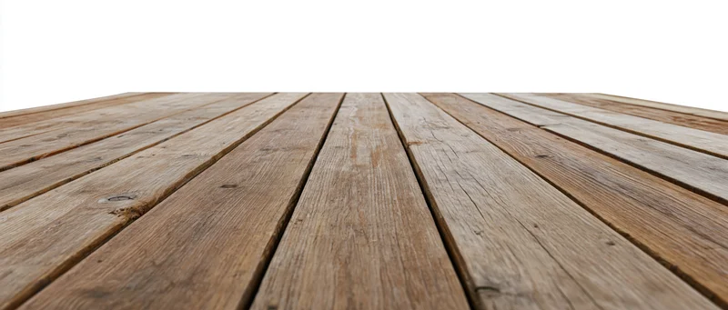 Wooden plank floor surface receding in perspective against white background