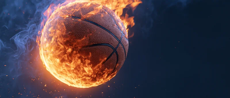 Basketball engulfed in flames against dark background with sparks and smoke