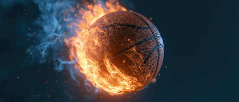 Basketball engulfed in flames and smoke against dark background