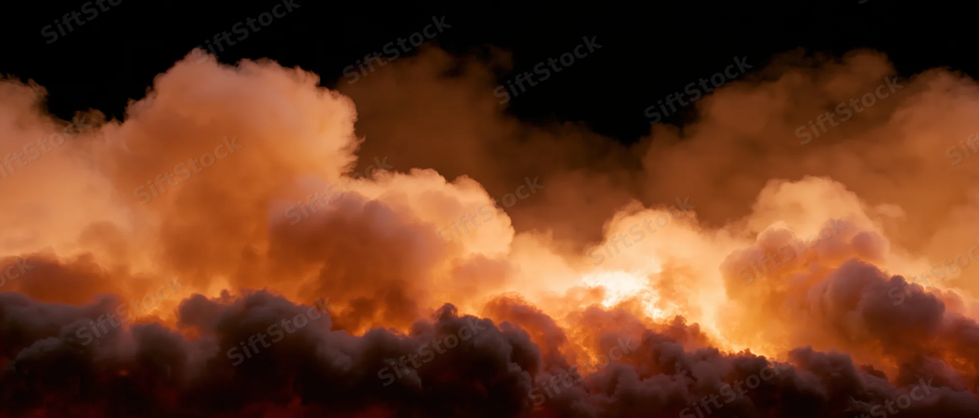 Billowing fire and smoke filling the frame horizontally wide at night