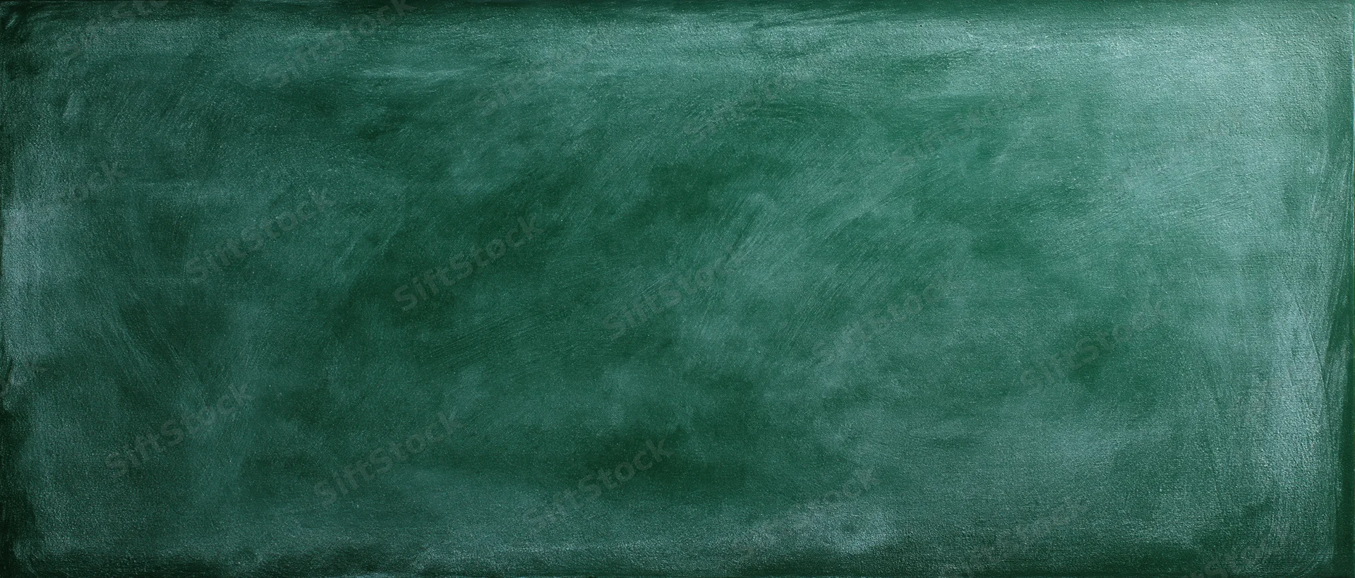 Worn green chalkboard surface filling the frame with smudged texture and eraser marks