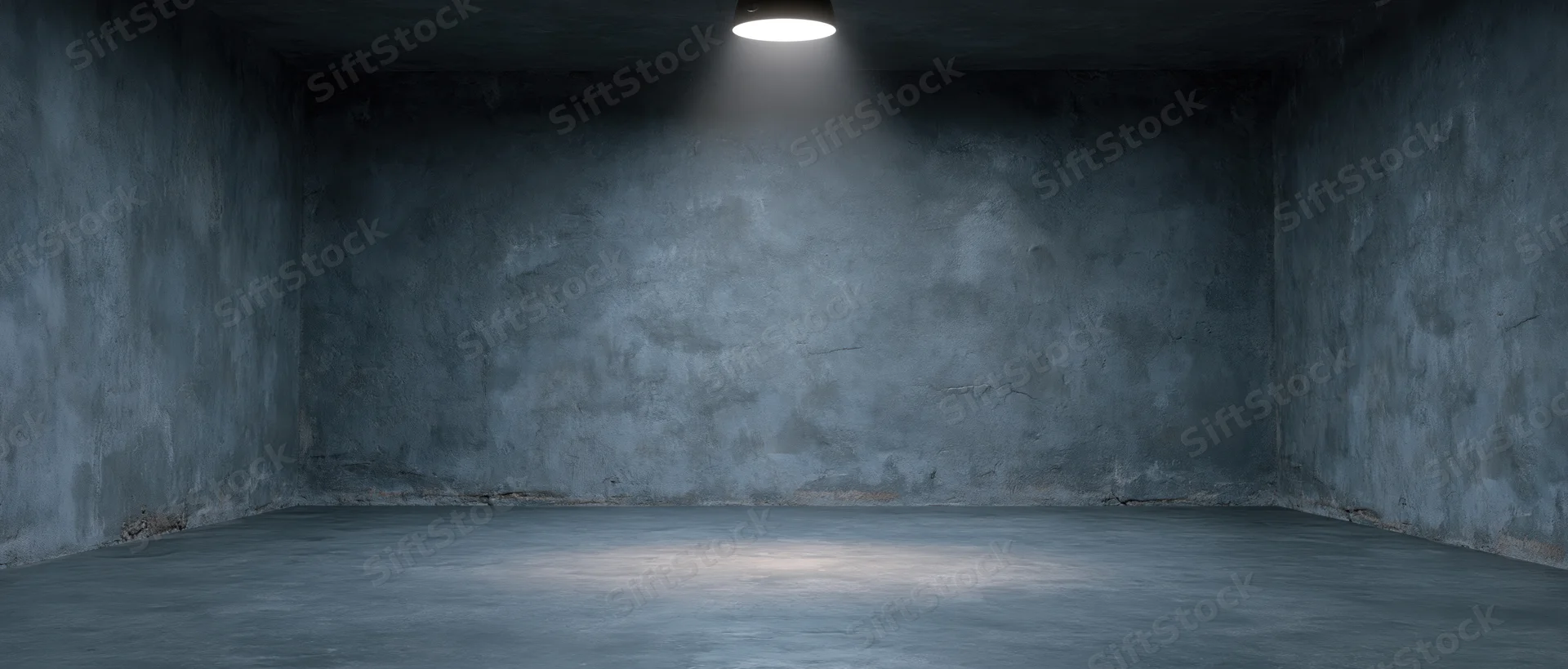 Empty concrete studio room with spotlight on textured cement walls and floor