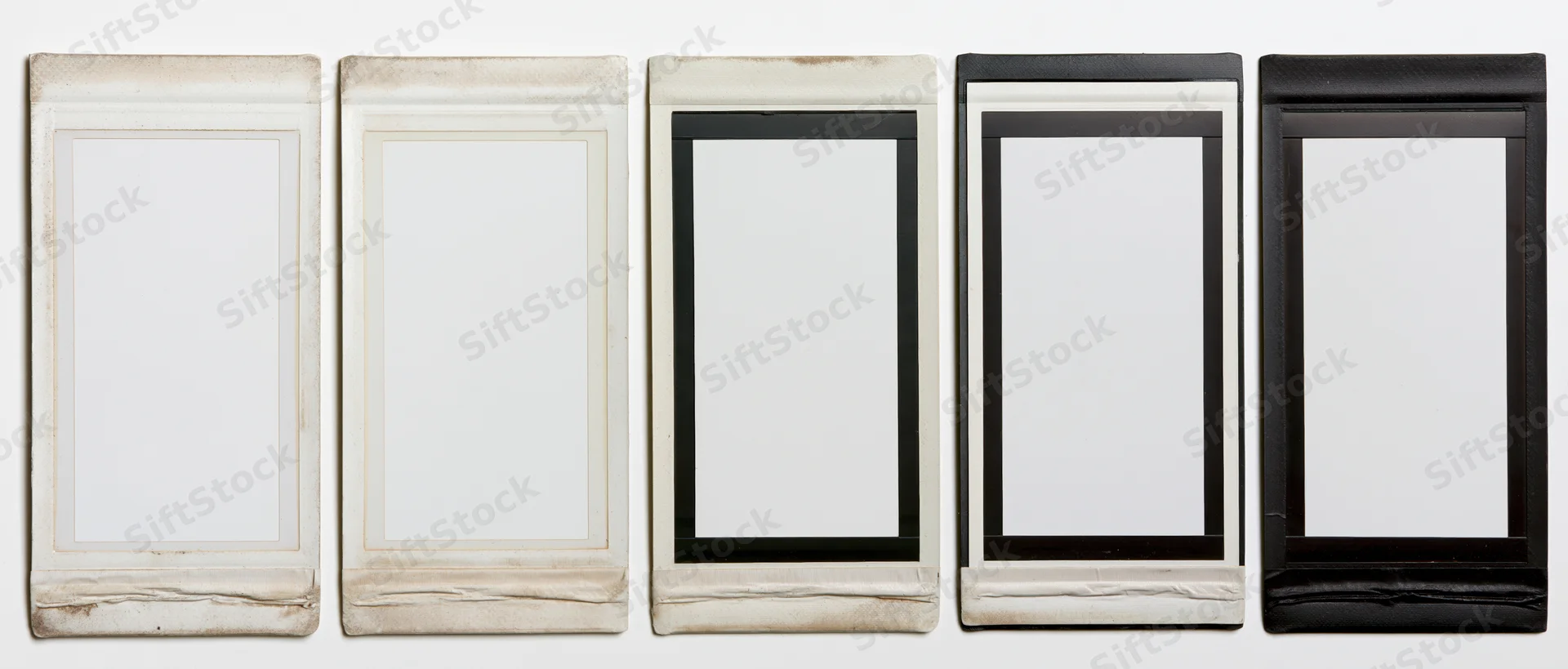 Five blank instant film photo frames arranged horizontally in a row