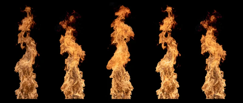 Five vertical fire flame columns burning against a black background
