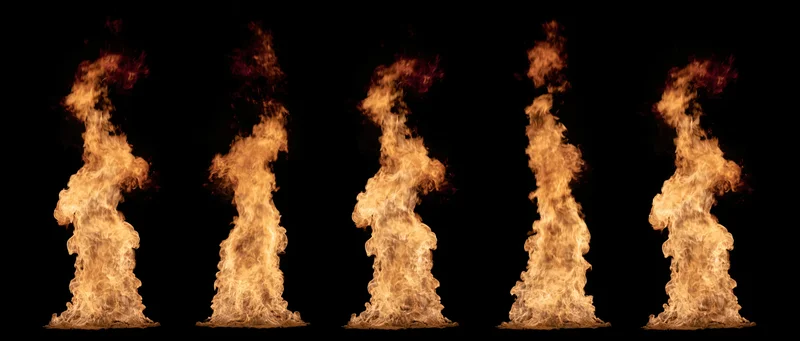 Five vertical fire flame columns burning against a black background