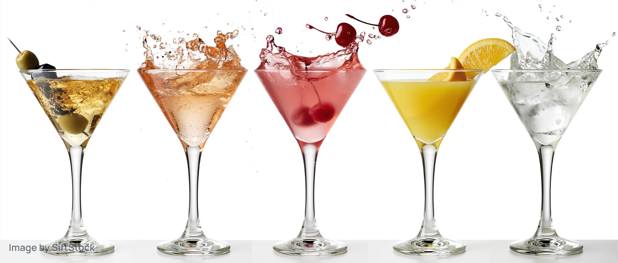 Five martini glasses in a row each filled with different cocktails and garnishes on a white background
