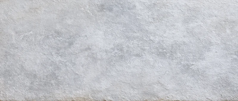 Close-up of a textured concrete wall surface filling the frame