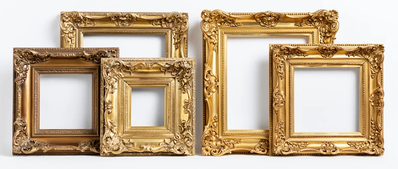 Ornate gold picture frames arranged side by side against white background