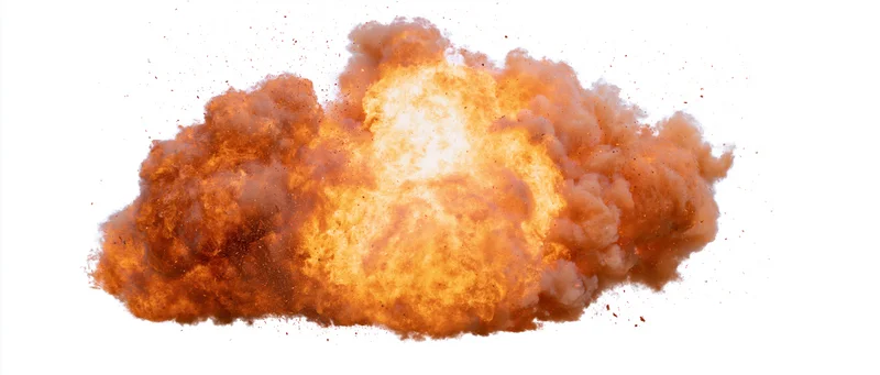 Fiery explosion with leaping flames and flying embers isolated on white background