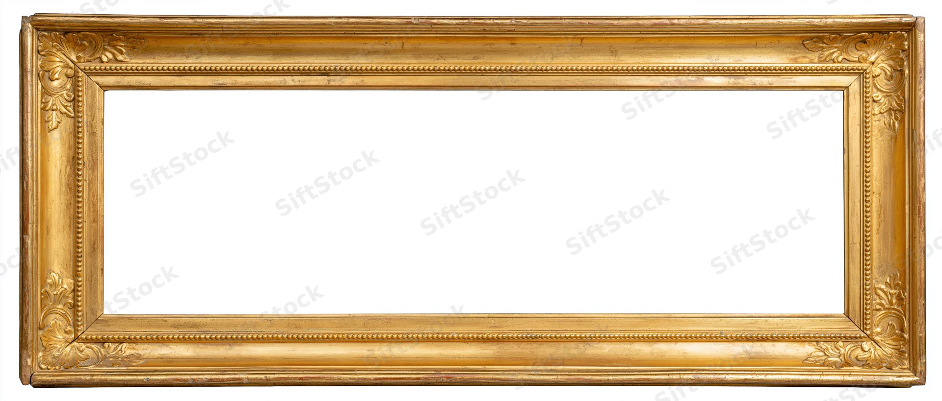 Ornate antique gold picture frame with floral carvings and beaded molding, flat-lay view