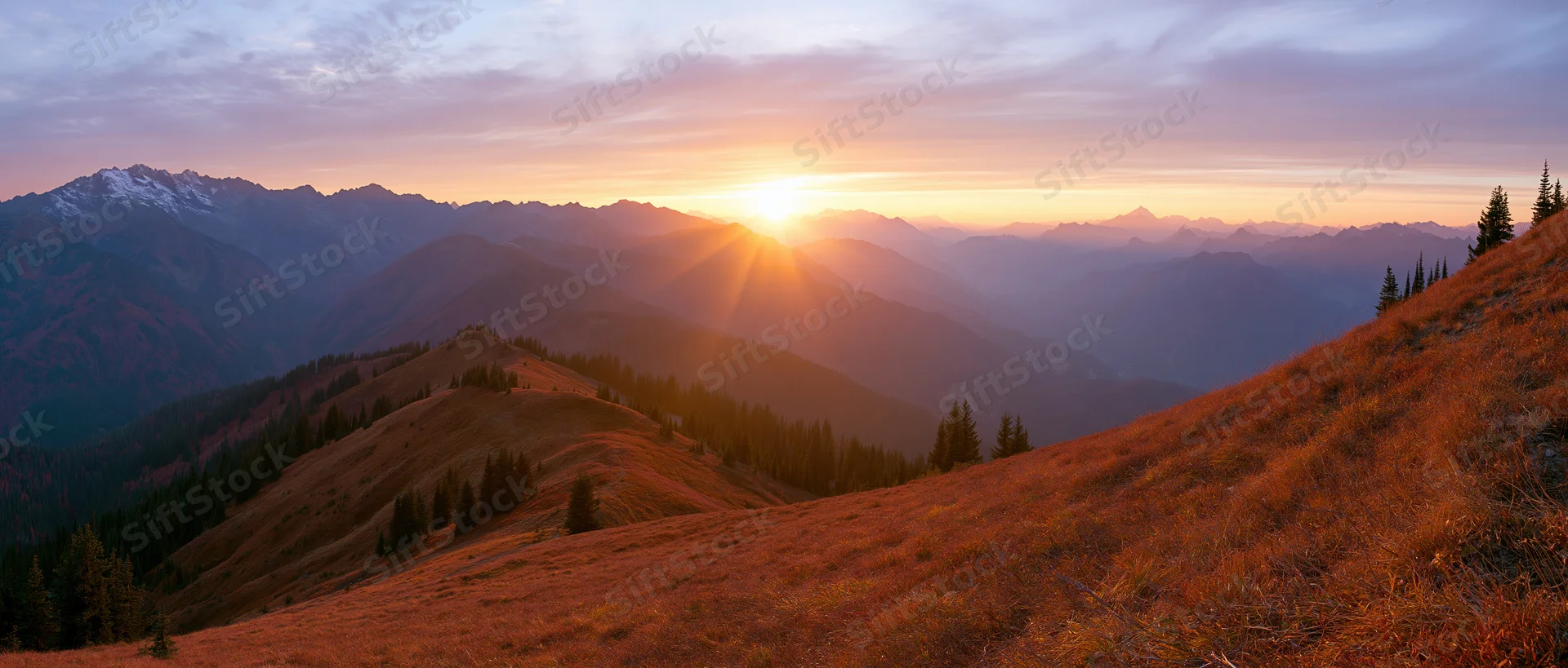 Panoramic alpine landscape at golden sunset with layered mountains and forested slopes