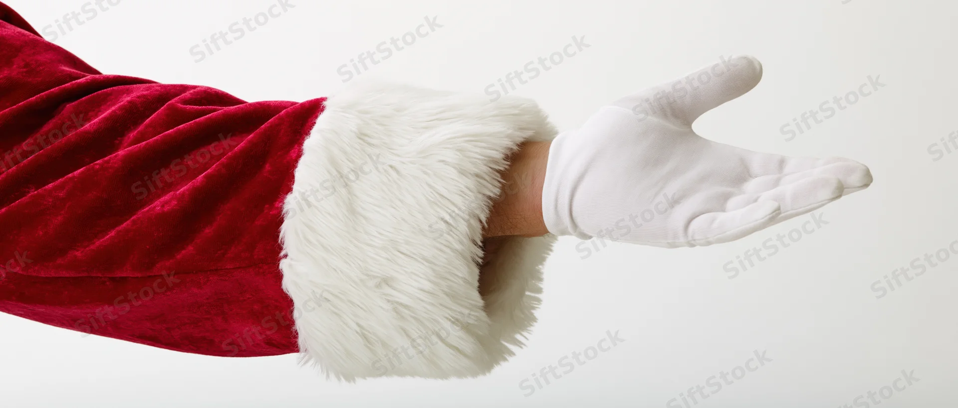 Santa's gloved hand extended with open palm against white background