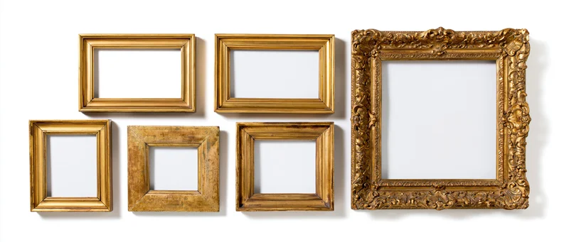 Six antique gold picture frames arranged in a horizontal row on a white background