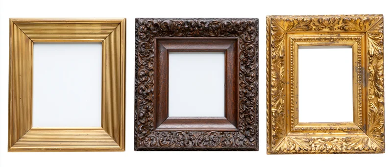 Three antique ornate picture frames arranged side by side on white background