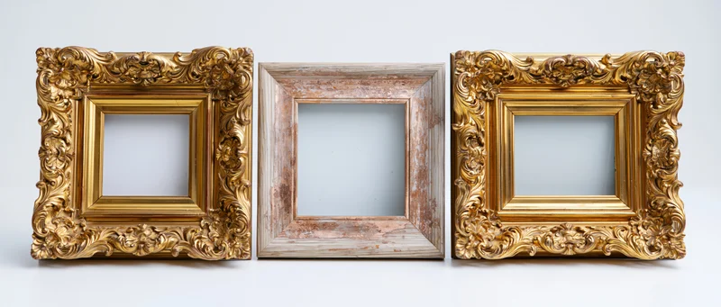 Three antique picture frames arranged side by side against a white background