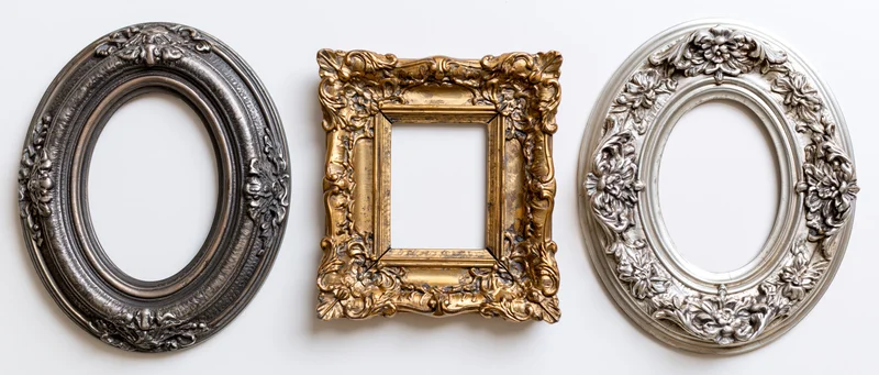 Three ornate antique picture frames arranged side by side on white background