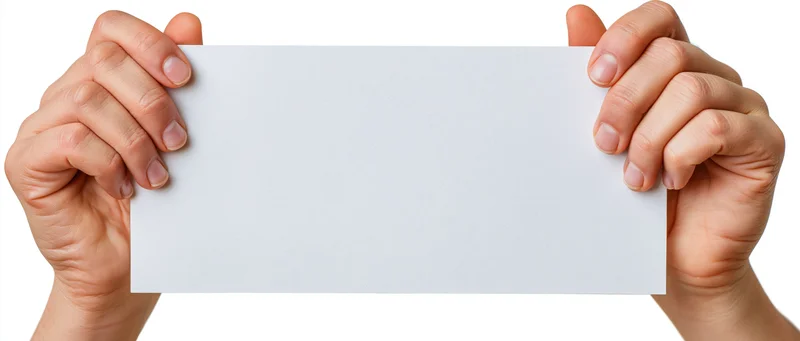 Adult hands holding a blank white paper sheet horizontally against white background