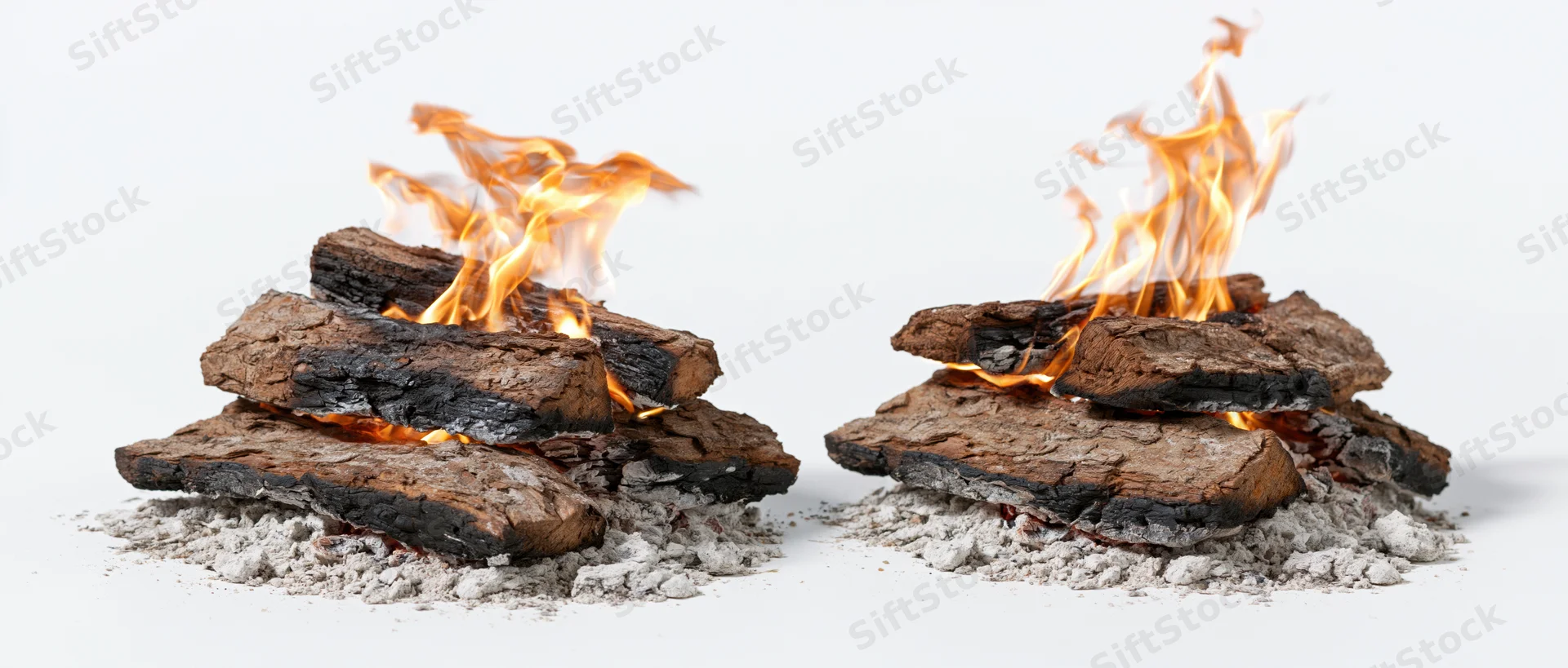 Two campfires burning with flames and ash on a white studio background