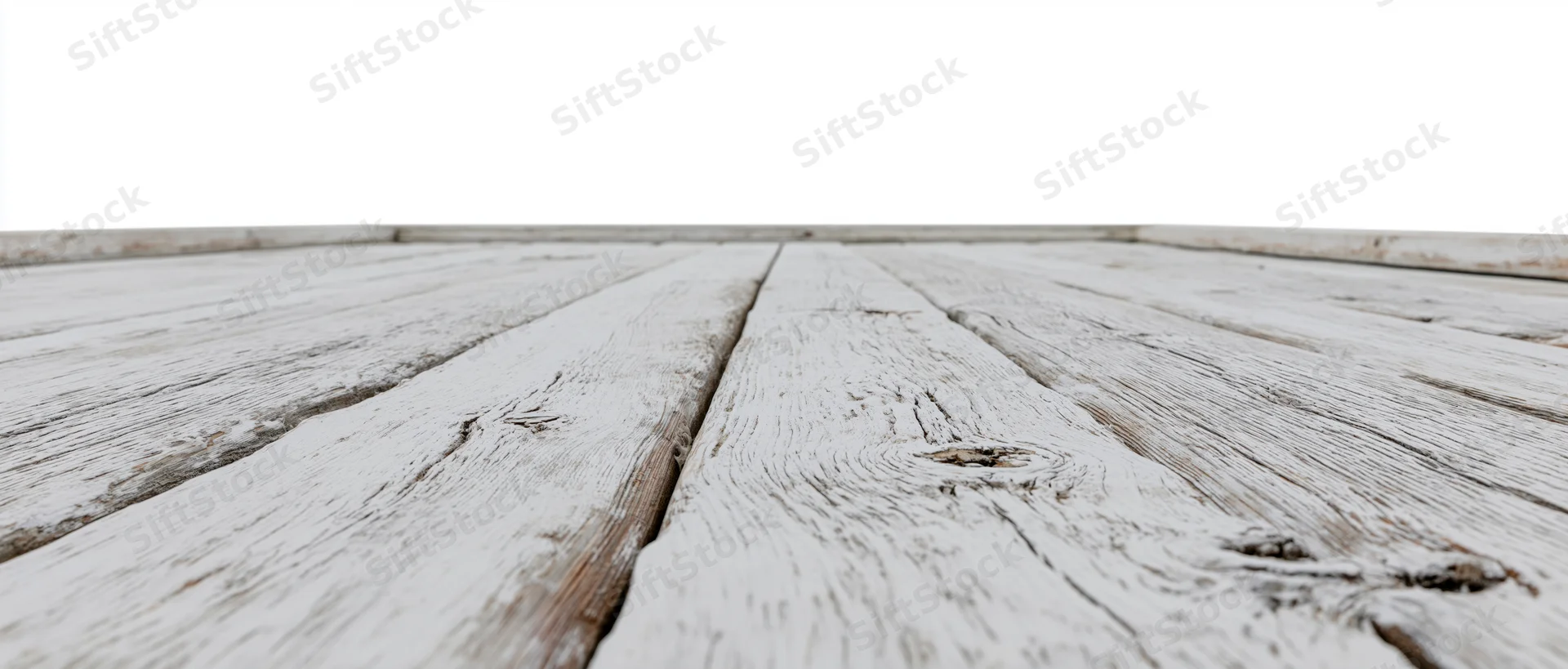 Weathered white-painted wooden floor planks receding into the distance with a clean white background above