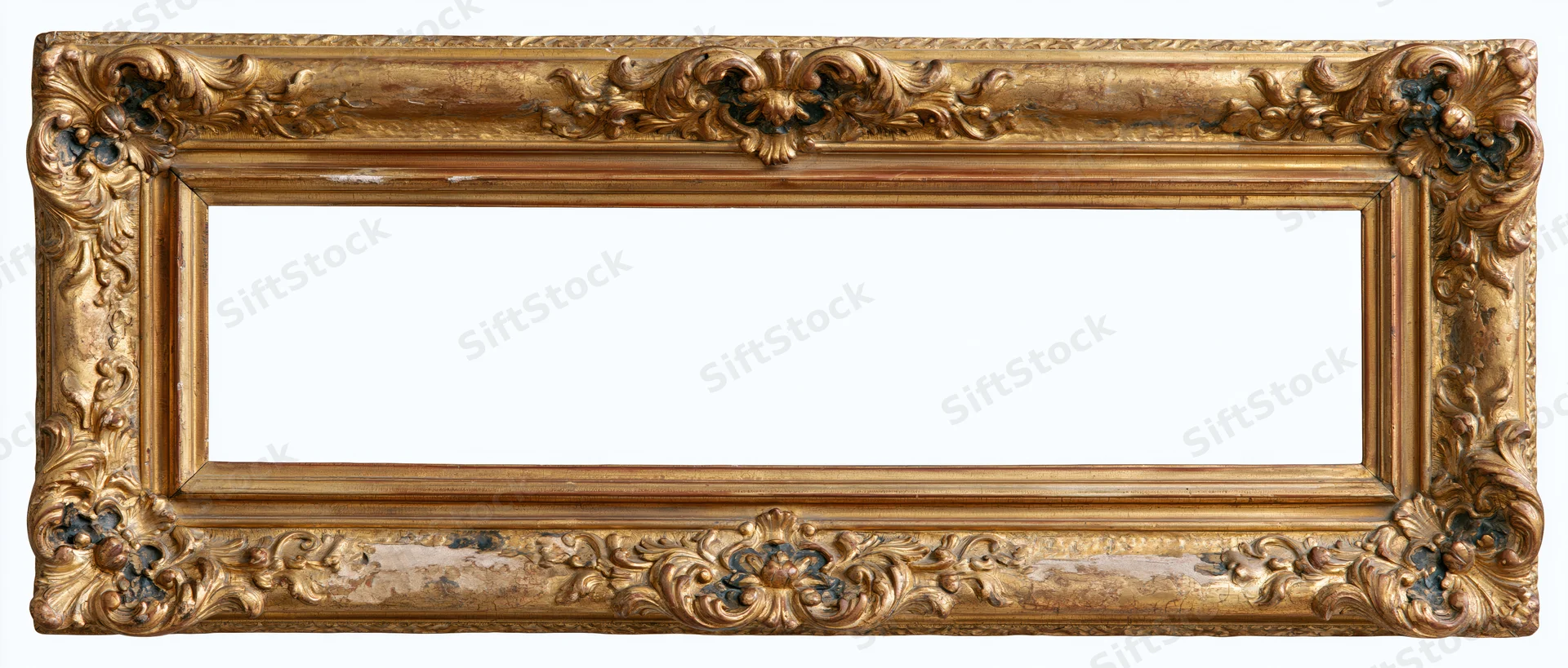 Ornate baroque gold frame with intricate carved floral details isolated on white background