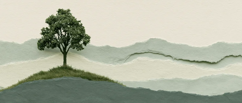 A single deciduous tree standing on a small grass-covered hill against a layered paper-textured background