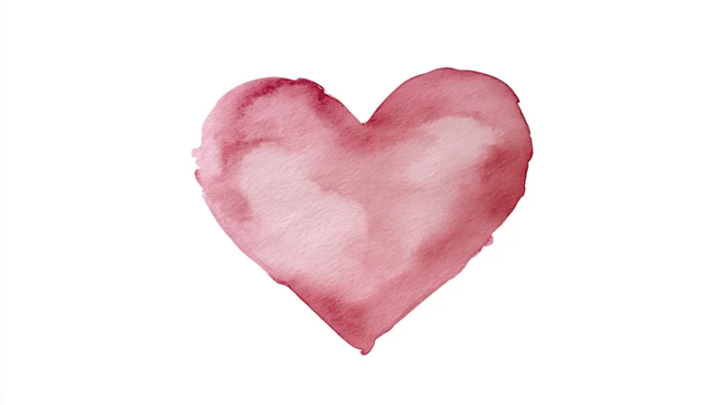 Watercolor heart painted in soft rose pink on white background