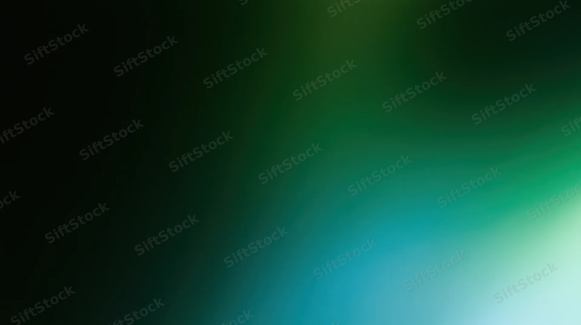 Abstract blurred gradient background transitioning from dark green to light teal