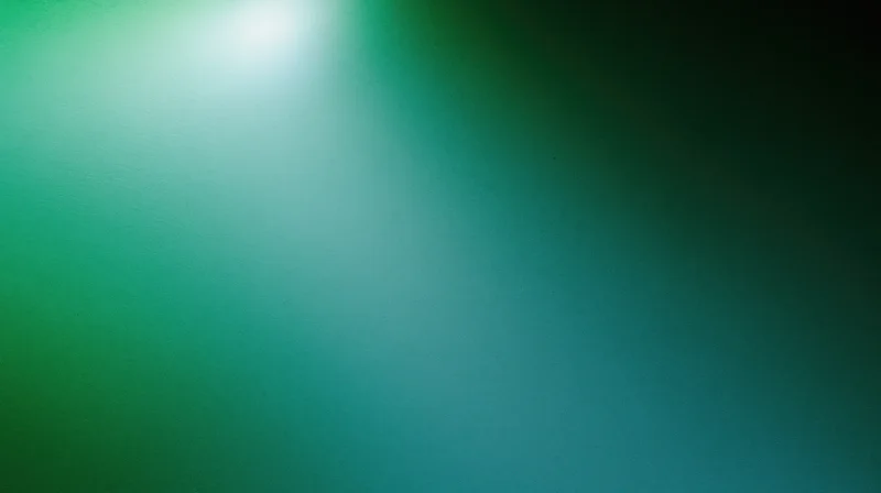 Smooth green to blue gradient background with grainy texture and light glow