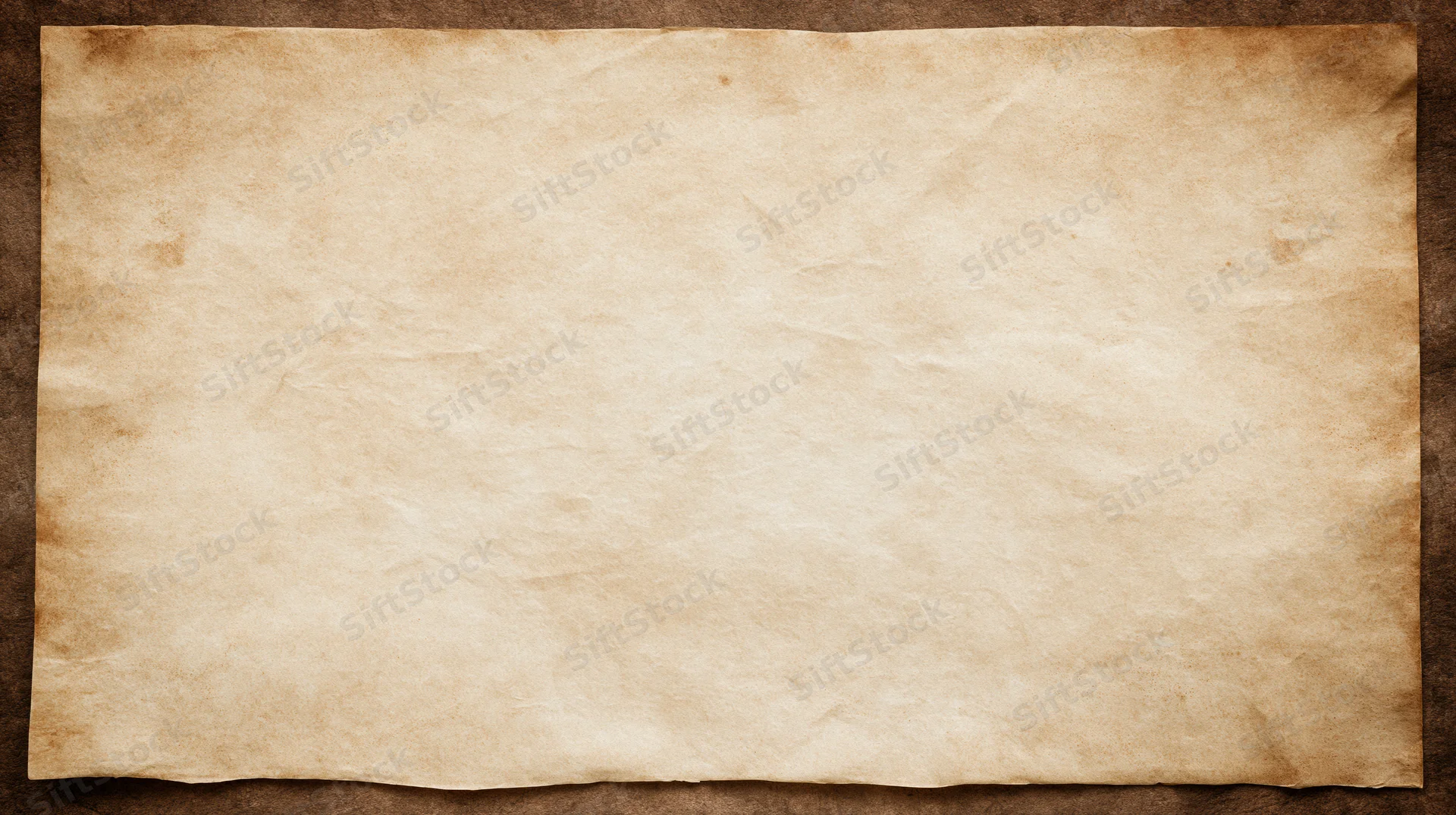 Aged parchment paper sheet laid flat filling the frame