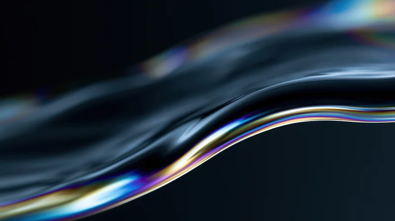 Flowing dark liquid glass surface with iridescent rainbow reflections